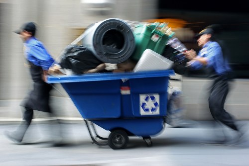 Professional waste clearance truck at a construction site